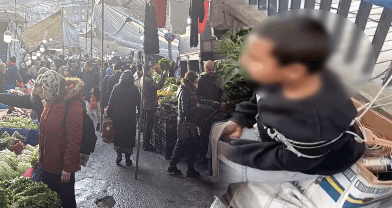 Pazarda çocuğu iple bağladı